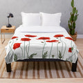 Plush blanket with elegant red and white poppy flower design
