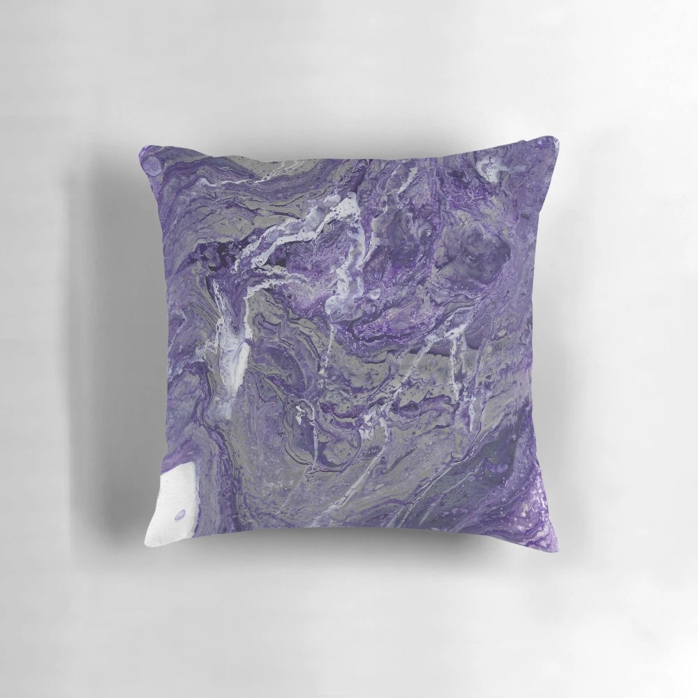 A beautiful purple and grey marble-patterned throw pillow with a fluid, abstract design, perfect for modern home decor.