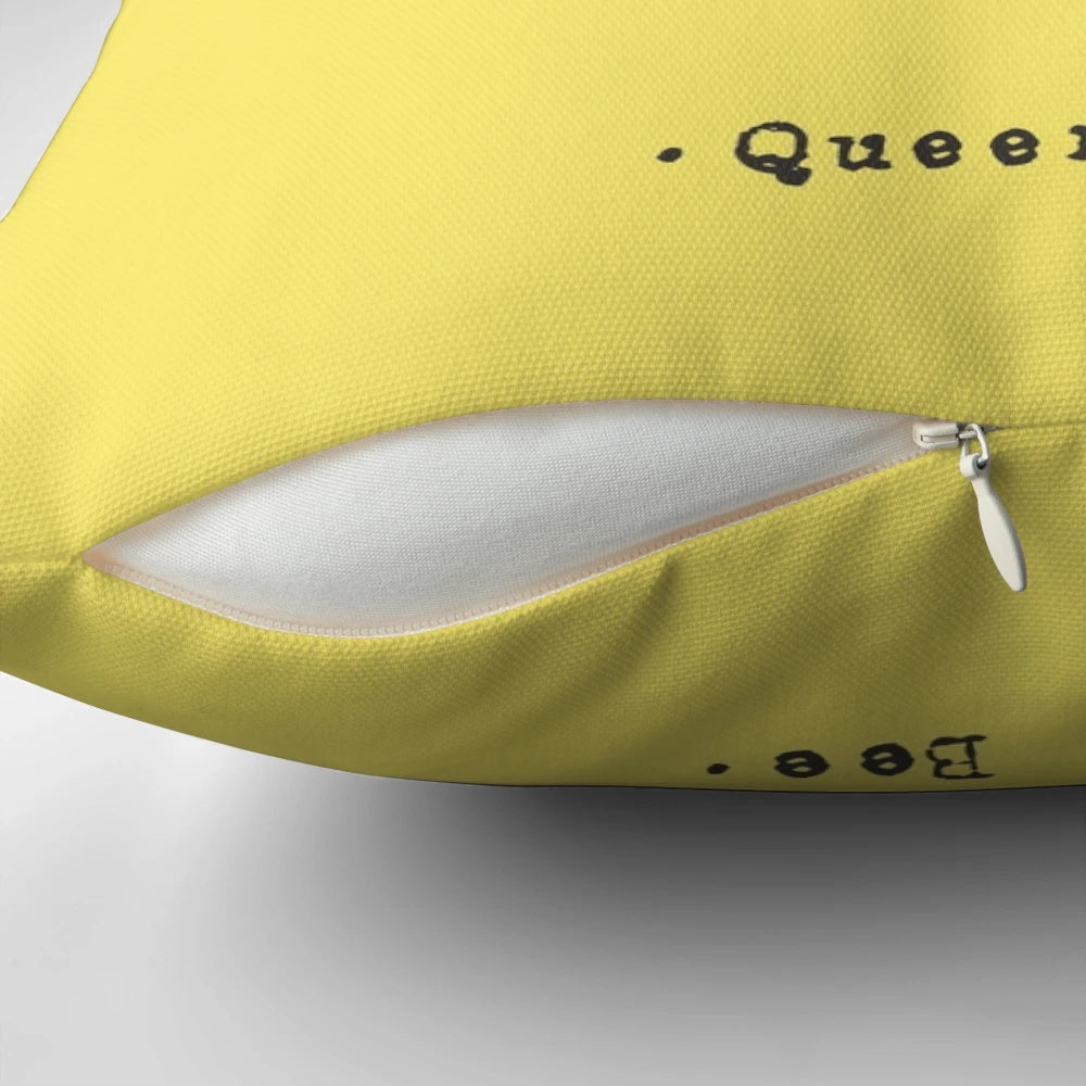 Soft, decorative queen bee pillow with yellow and black patterns, perfect for natural, bee-inspired home accents.