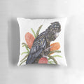 Vibrant red-tailed black cockatoo perched on Australian banksia flowers, designed for a stunning home accent.