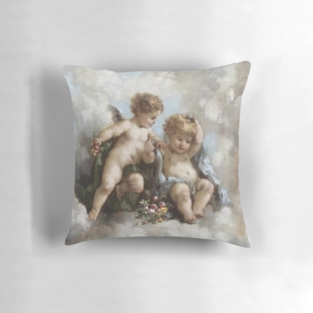 Soft, decorative throw pillow featuring a vintage-style angel cherub design in a renaissance-inspired aesthetic.