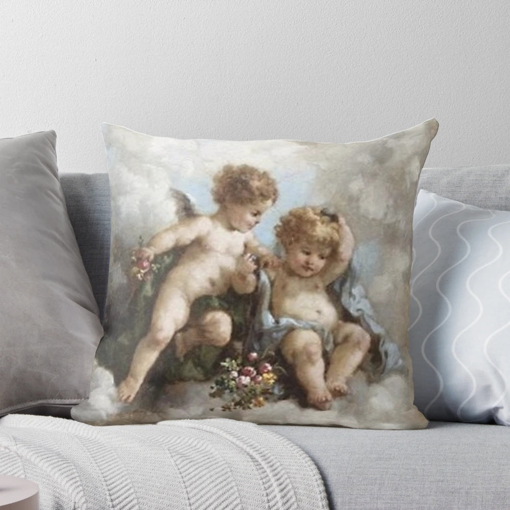 Soft, decorative throw pillow featuring a vintage-style angel cherub design in a renaissance-inspired aesthetic.
