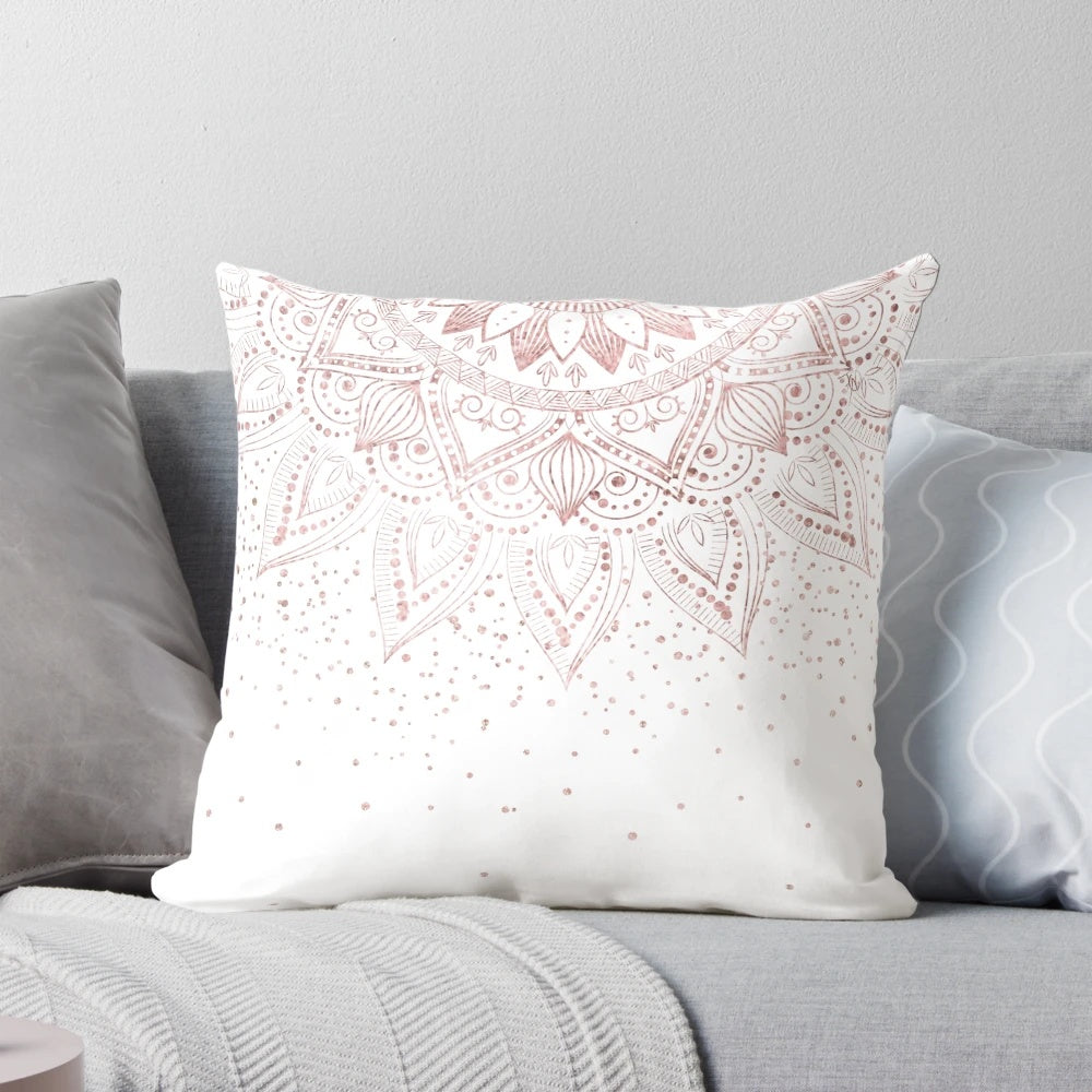 Rose gold mandala design decorative throw pillow with delicate, geometric patterns