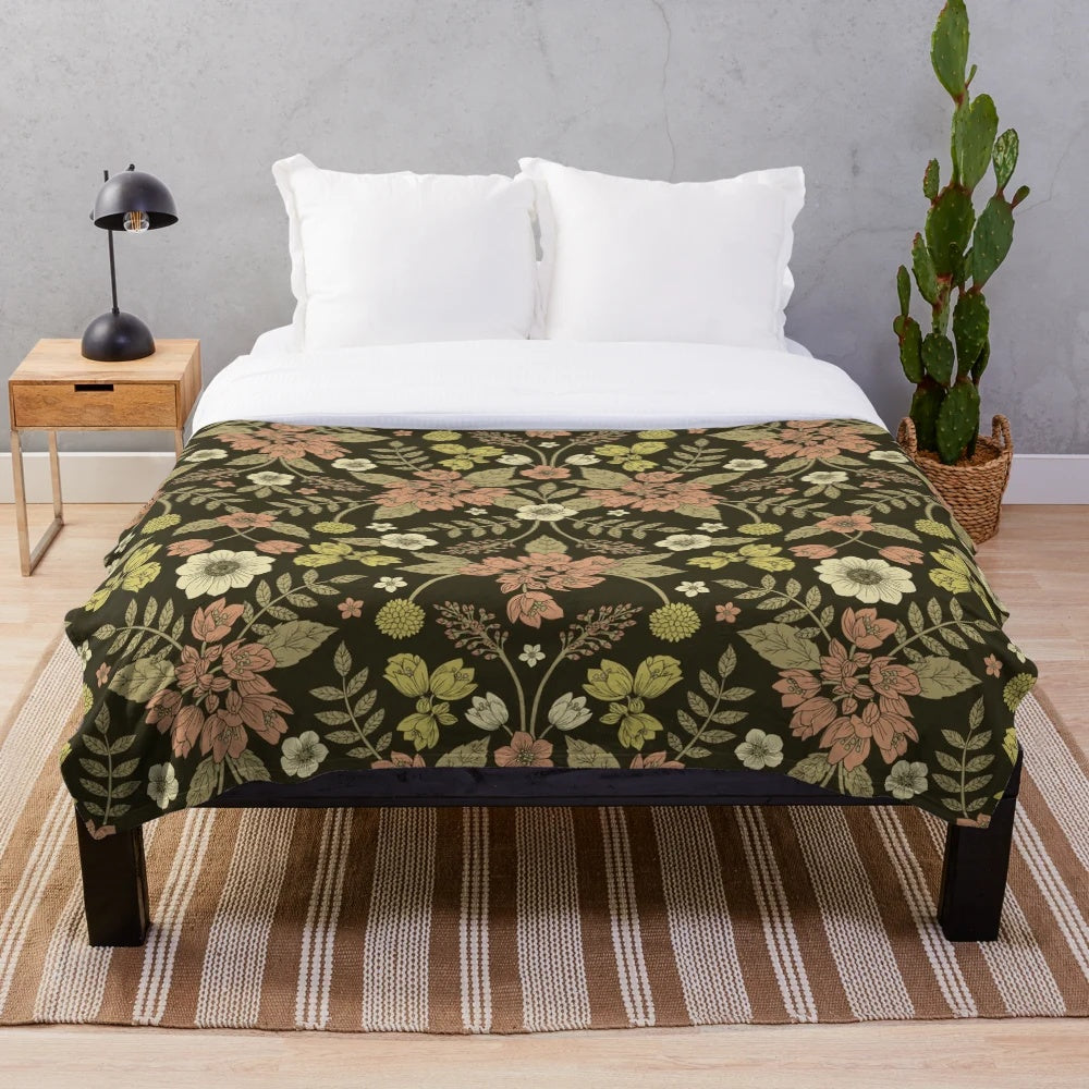 Sage, dark green, peach, and cream floral pattern plush blanket