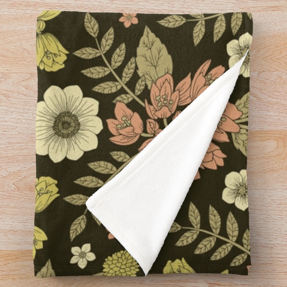 Sage, dark green, peach, and cream floral pattern plush blanket