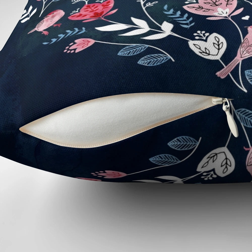 A navy blue decorative pillow featuring a beautiful Scandinavian-inspired watercolor floral pattern.