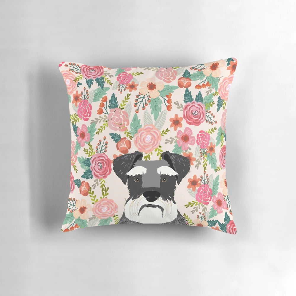 A beautiful floral-patterned throw pillow featuring the portrait of a Schnauzer dog.