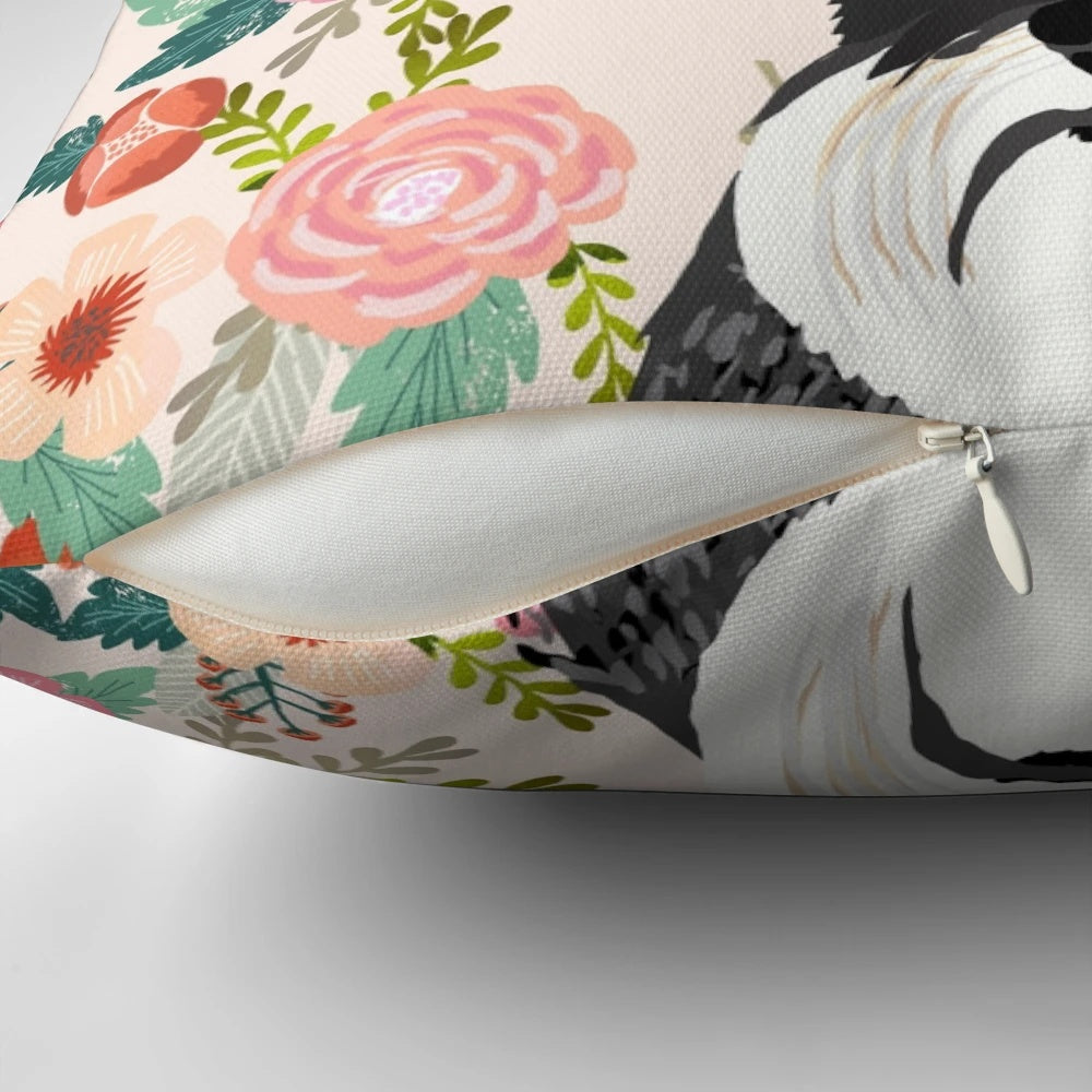 A beautiful floral-patterned throw pillow featuring the portrait of a Schnauzer dog.