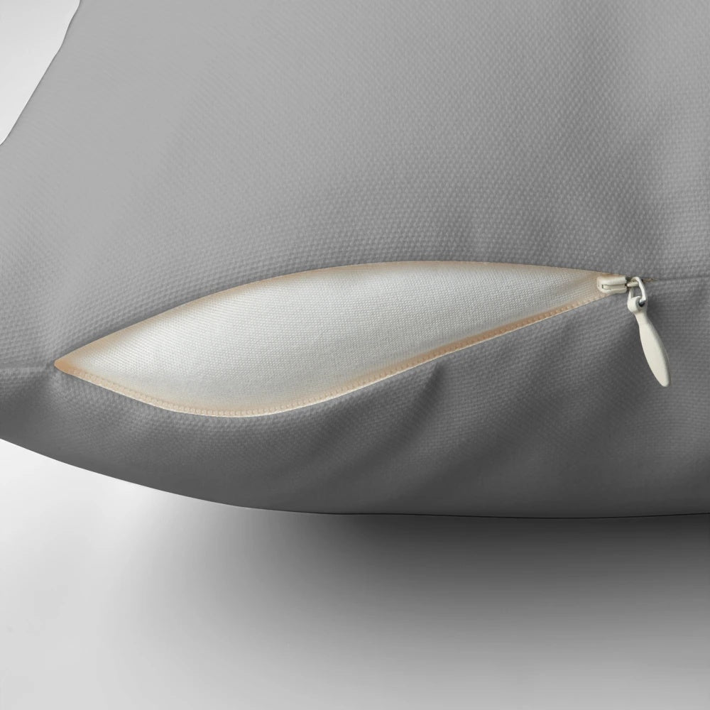 A high-quality gray pillow with a smooth, solid design