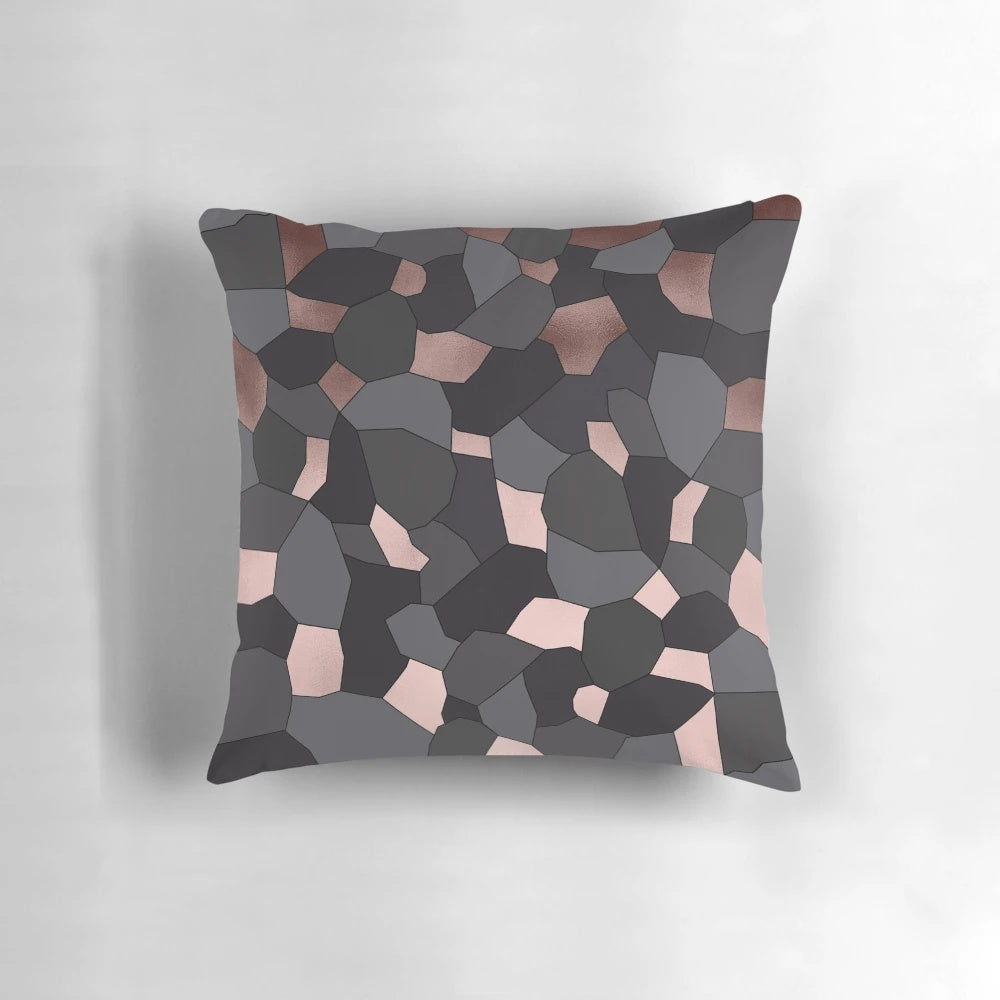 Luxurious rose gold and grey mosaic patterned pillow with a touch of glamour and sophistication.