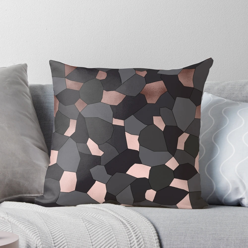 Luxurious rose gold and grey mosaic patterned pillow with a touch of glamour and sophistication.