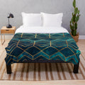 Teal and gold geometric pattern plush blanket