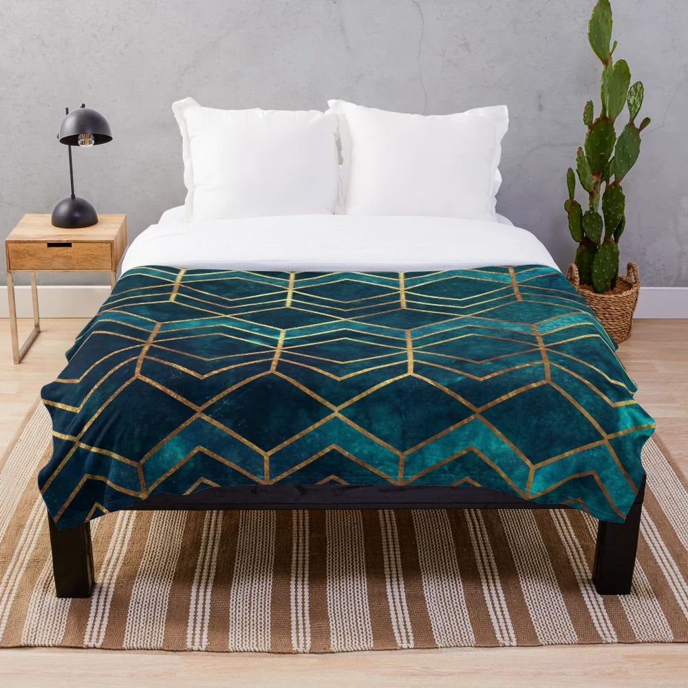 Teal and gold geometric pattern plush blanket