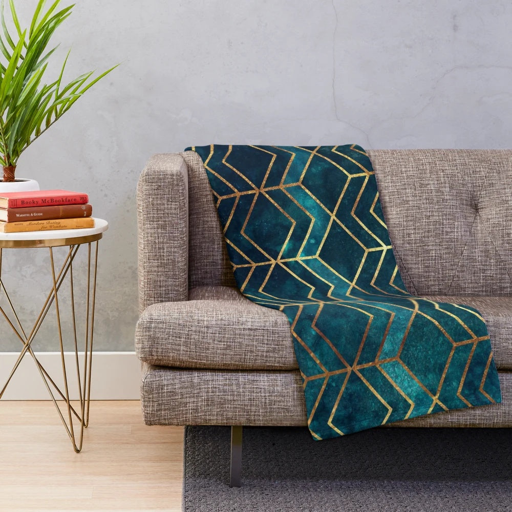 Teal and gold geometric pattern plush blanket