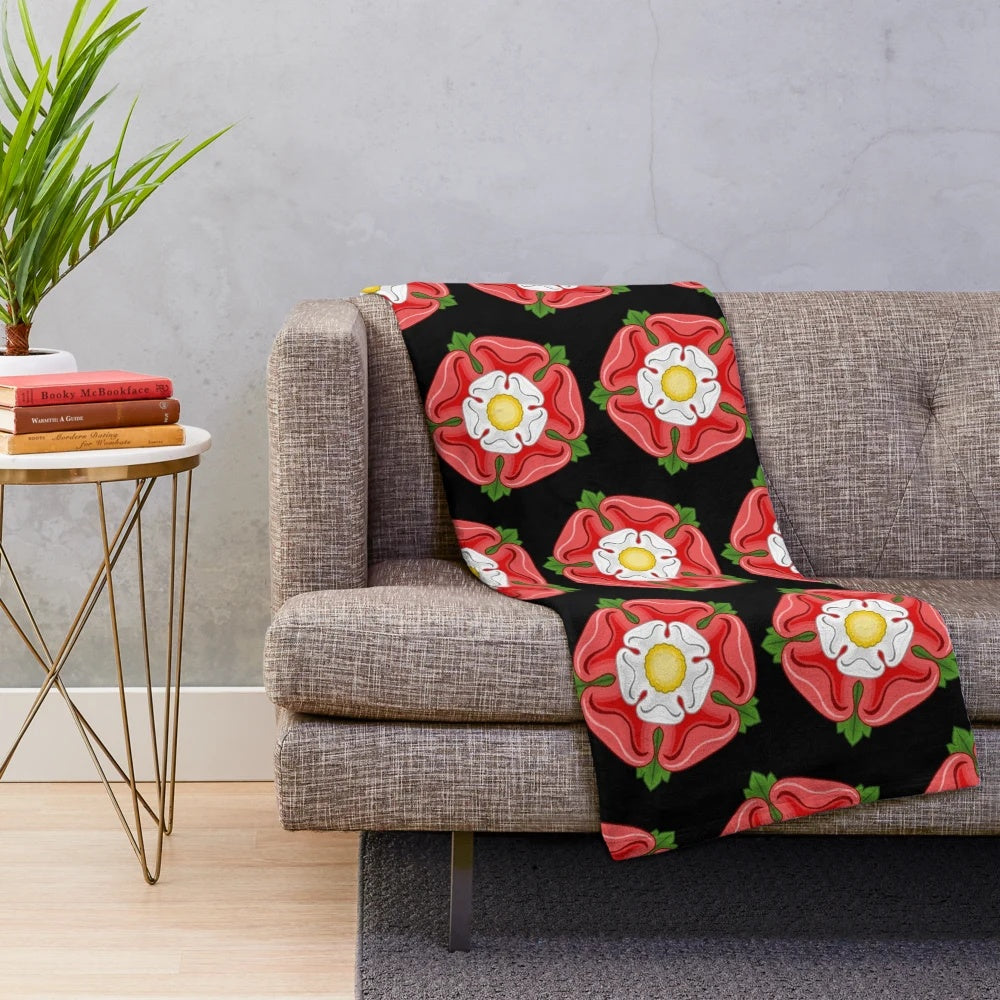 Luxurious plush blanket featuring a Tudor rose design, a symbol of the Tudor royal dynasty