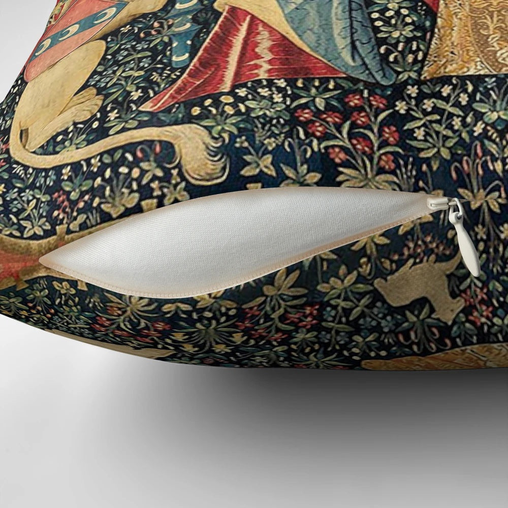 A beautiful black floral throw pillow featuring a mythological unicorn in a medieval garden setting.