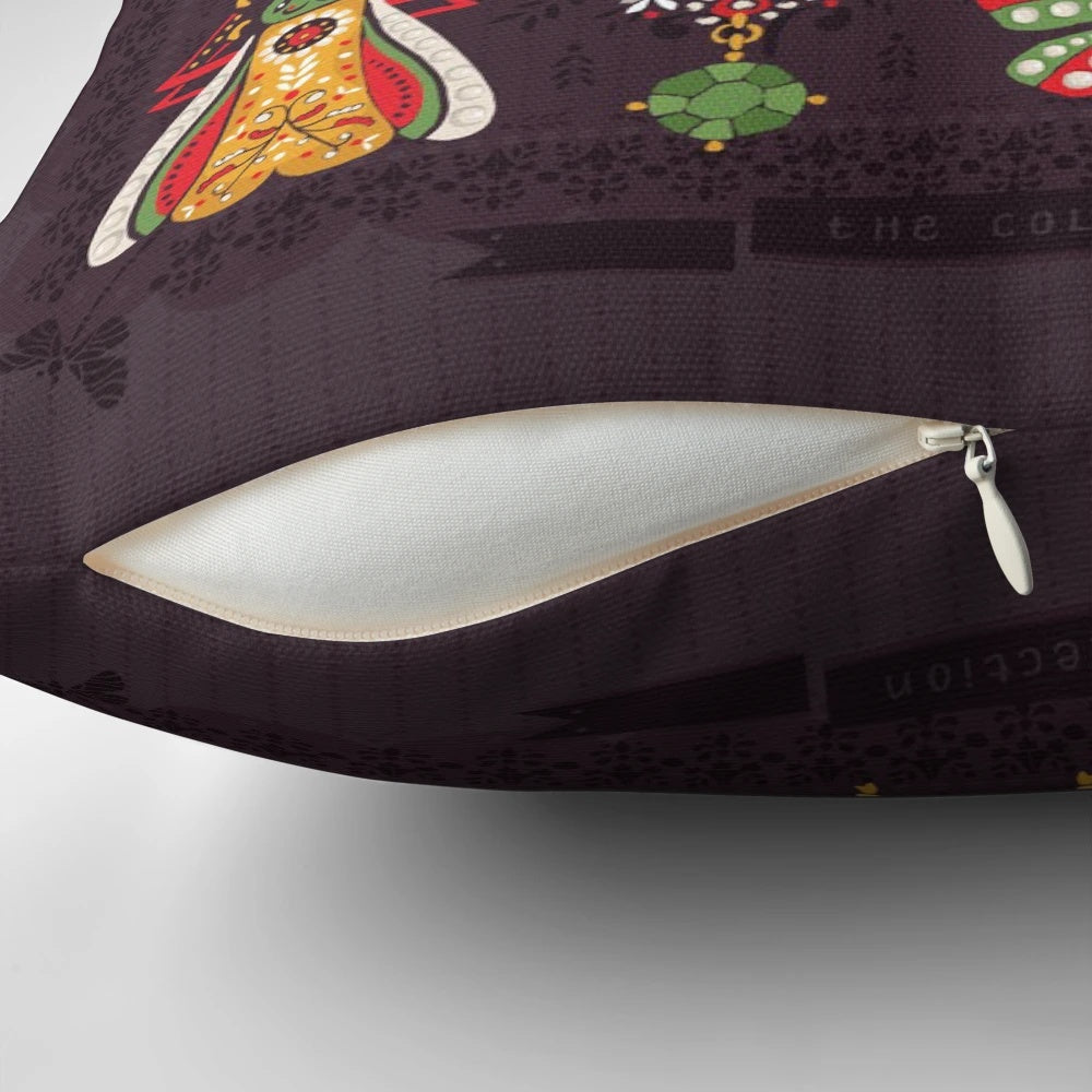 Vibrant, Victorian-styled pillow featuring intricate bug and jewelry designs