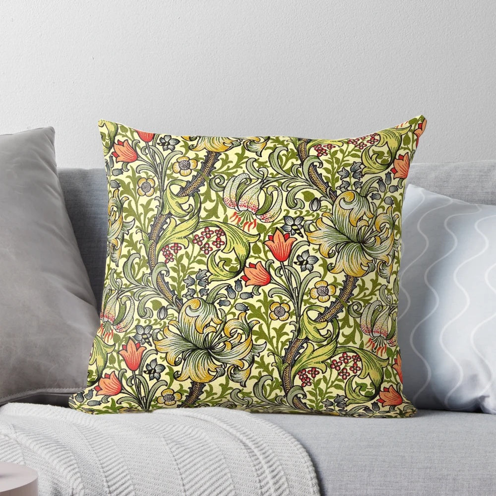 Close-up of a decorative vintage floral pattern pillow cover featuring the iconic William Morris golden lily design.