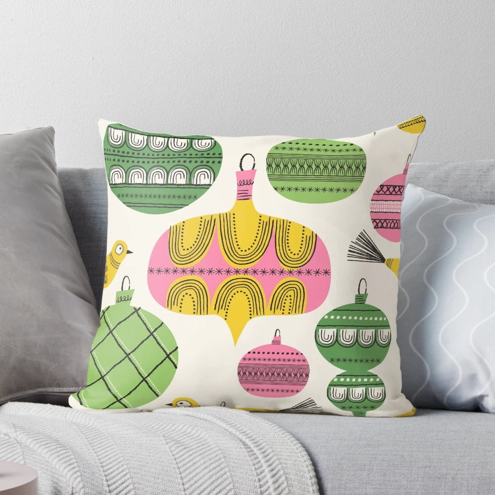 Vintage-inspired throw pillow with colorful Christmas ornament design