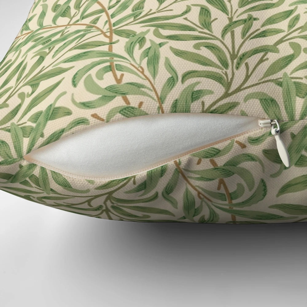 A vintage-inspired pillow featuring a willow tree leaves pattern, perfect for a natural, earthy decor.