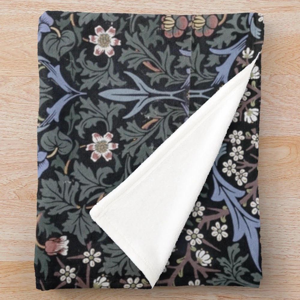 Cozy plush blanket featuring a William Morris-inspired blackthorn floral design