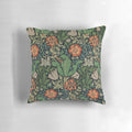 Antique floral decorative pillow featuring a nature-inspired william morris wallpaper pattern