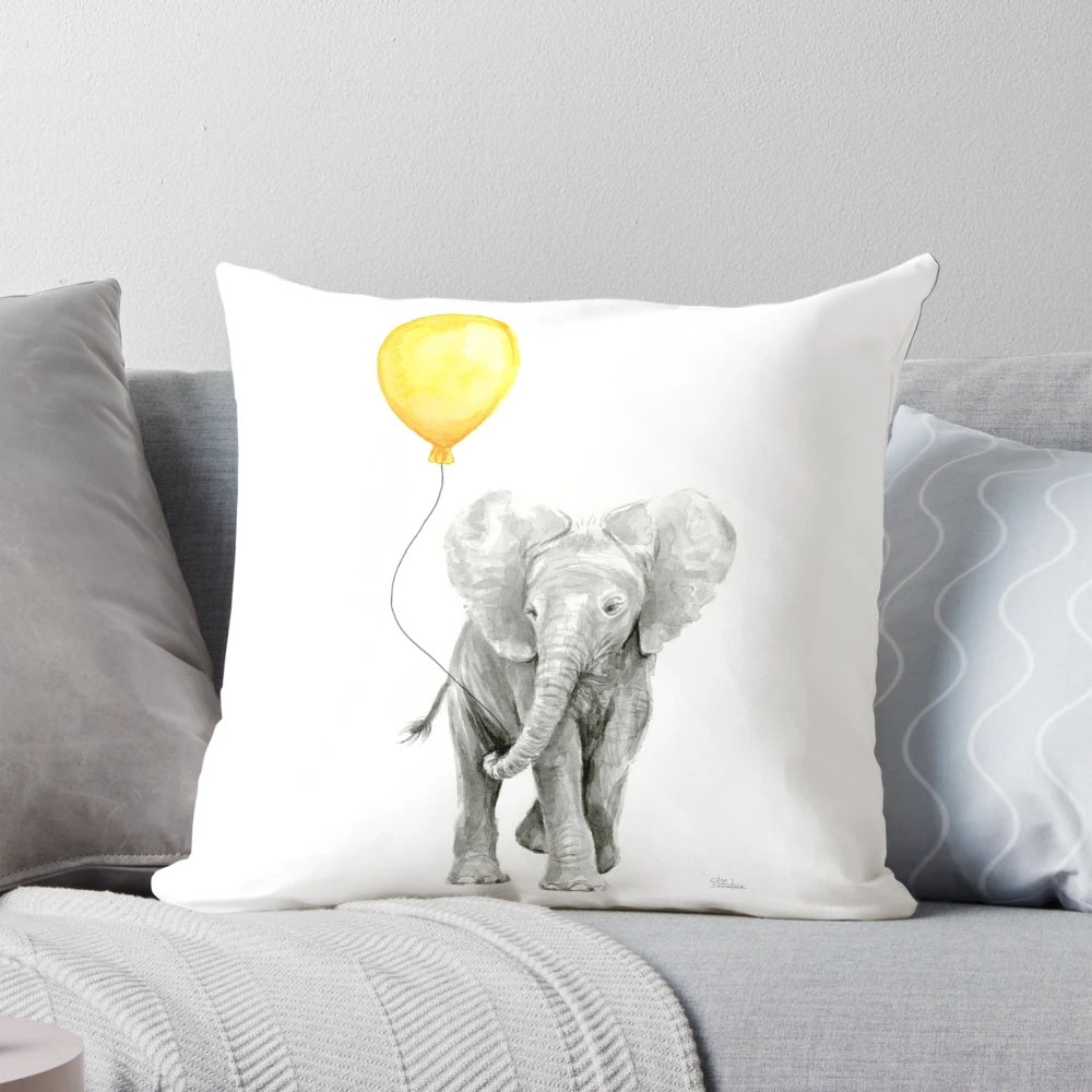Elephant baby watercolor illustration with a yellow balloon on a soft, plush pillow