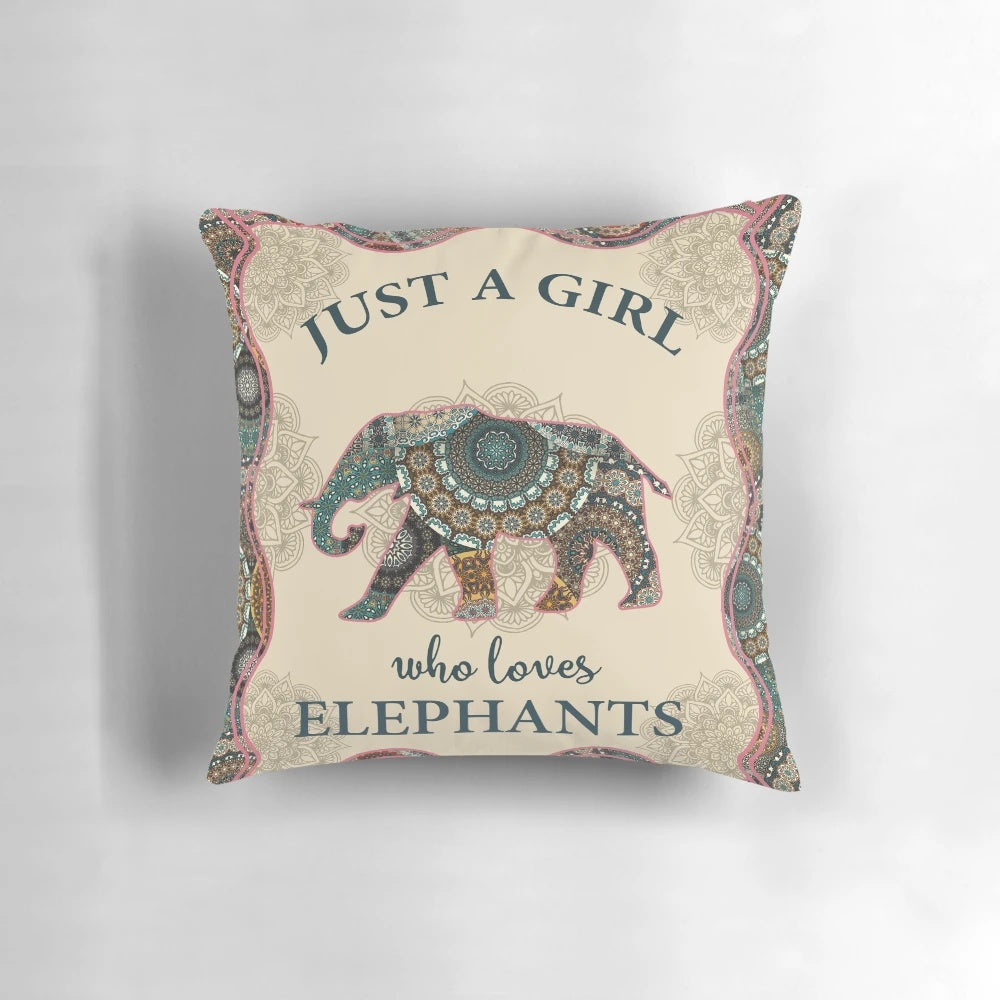 Colorful mandala design with an elephant in the center, printed on a cozy pillow