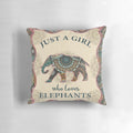 Colorful mandala design with an elephant in the center, printed on a cozy pillow
