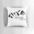 A cozy hiking pillow featuring a mountain graphic, perfect for outdoor adventures.