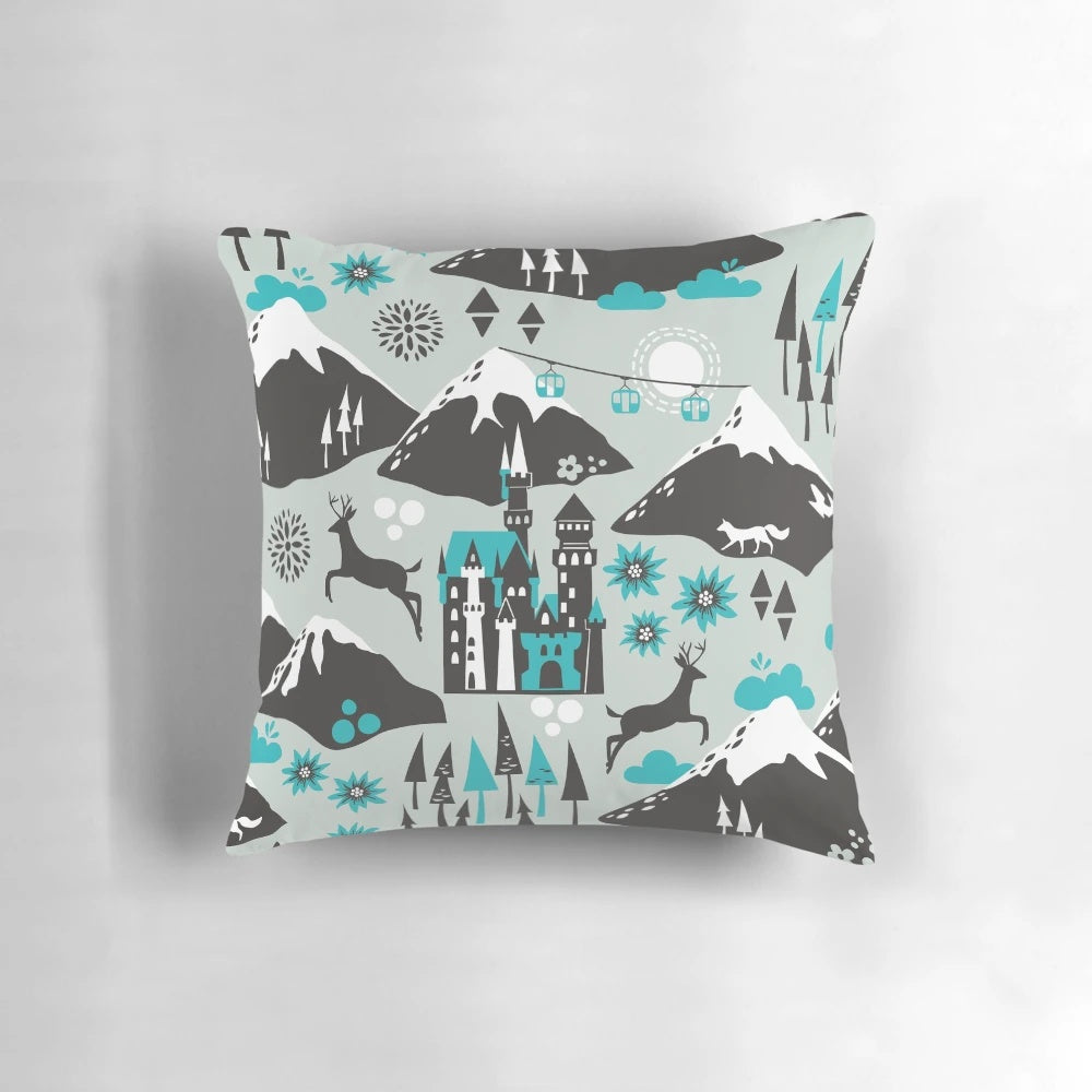 The Alps Pillow featuring a serene mountain landscape with snowy peaks, forests, and wildlife