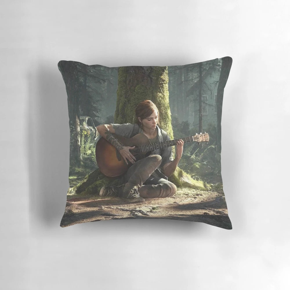 Decorative pillow featuring Ellie from the video game The Last of Us holding a guitar.