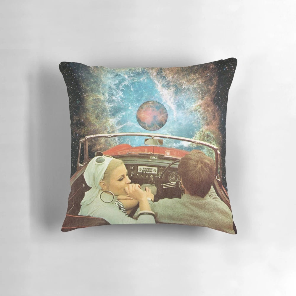 Colorful collage art pillow featuring a surreal space trip design with nebulas, stars, and the universe