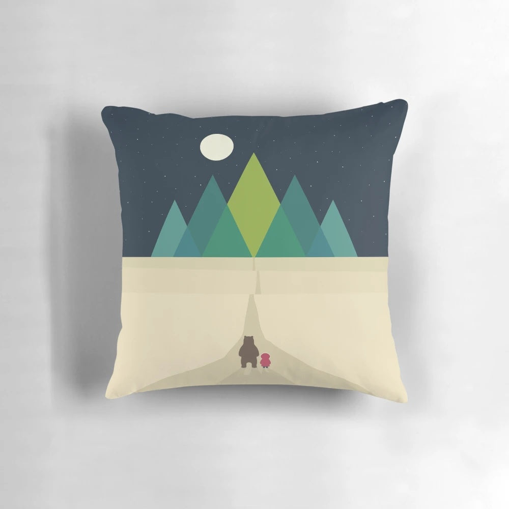 A soft, plush pillow featuring a brown bear design, perfect for travelers and adventurers