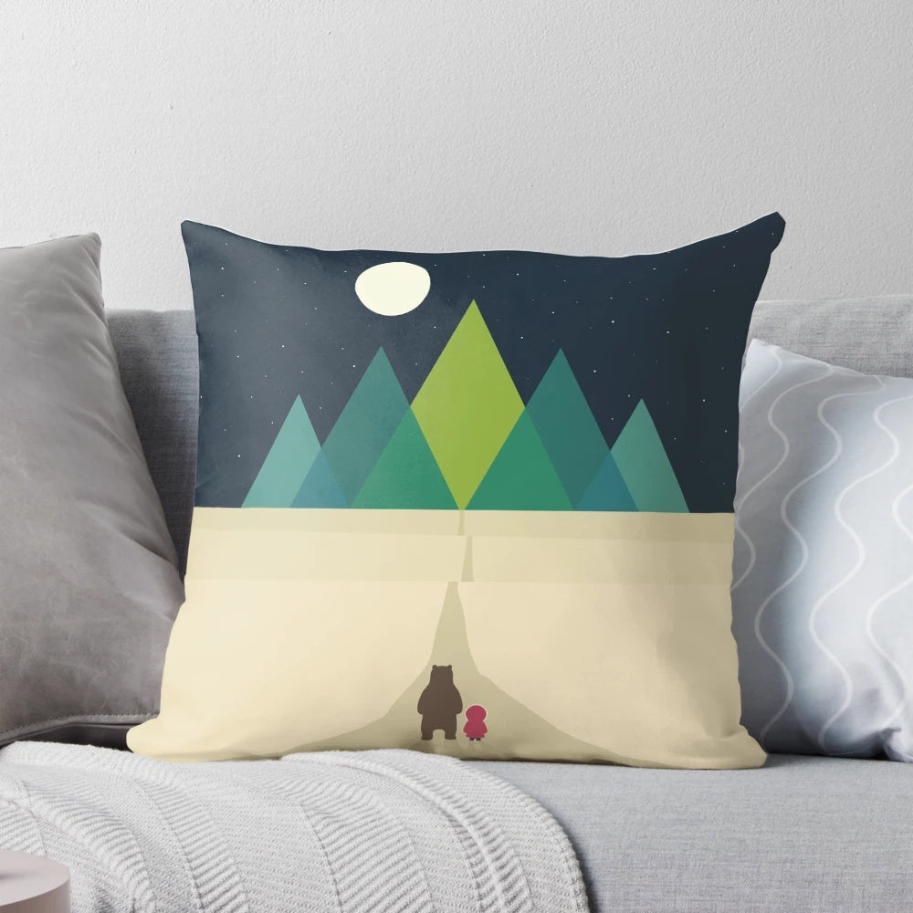 A soft, plush pillow featuring a brown bear design, perfect for travelers and adventurers