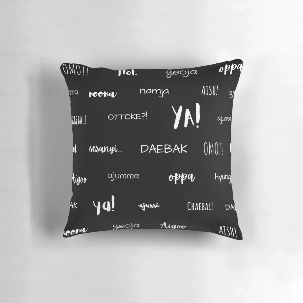 A black and white decorative pillow with handwritten Korean words and phrases, perfect for K-drama and K-pop fans.