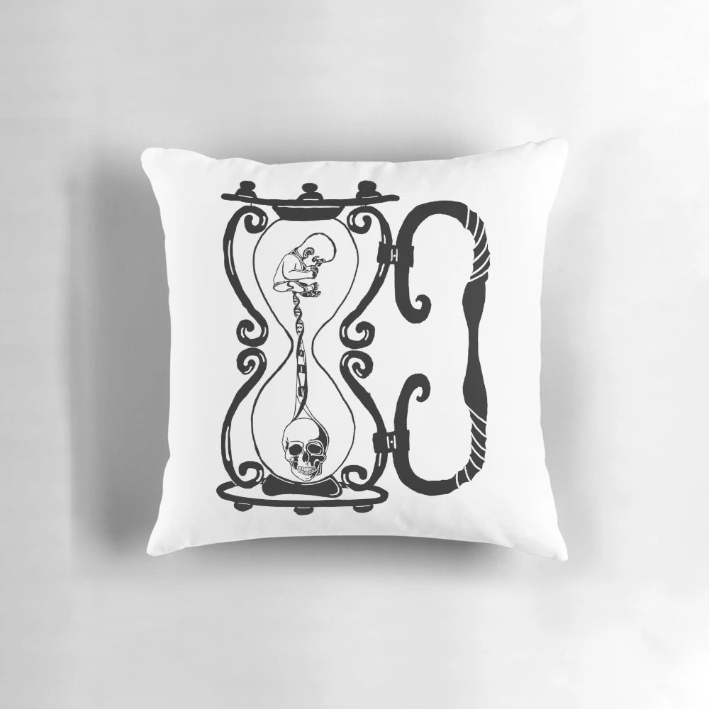 A stylish pillow featuring a skull design, embodying the cycle of life and death.