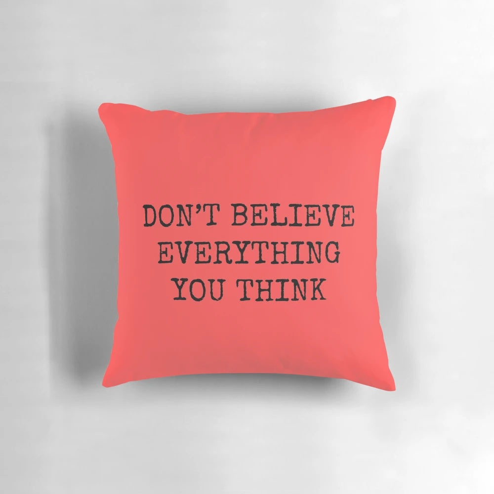 Don't Believe Everything You Think" Pillow featuring a calming, philosophical design
