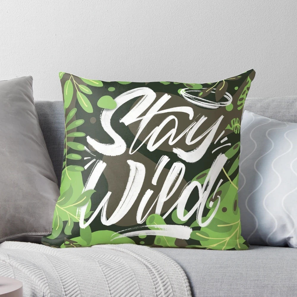 Stay Wild" Pillow featuring a nature-inspired graphic design