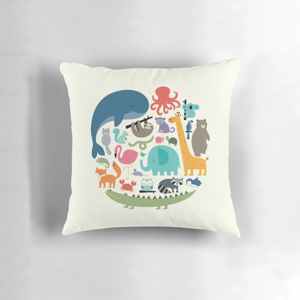 A cozy pillow featuring a vibrant animal print design, representing the unity and diversity of nature.