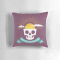 Rise Again Pillow featuring a sun rising over a skull, symbolizing new life and optimism.