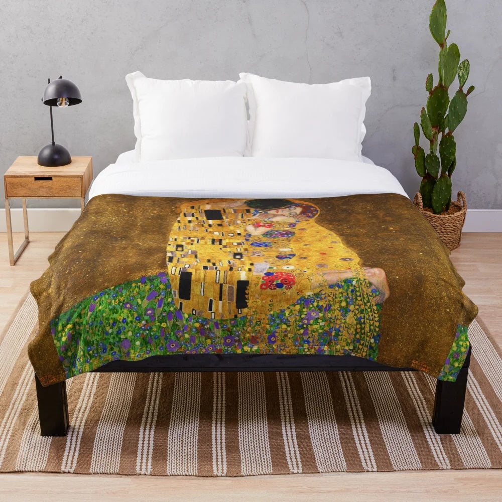 Plush blanket featuring the iconic painting "The Kiss" by Gustav Klimt