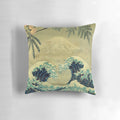 A nature-inspired landscape pillow featuring the iconic "Great Wave off Kanagawa" design in shades of blue and gold.