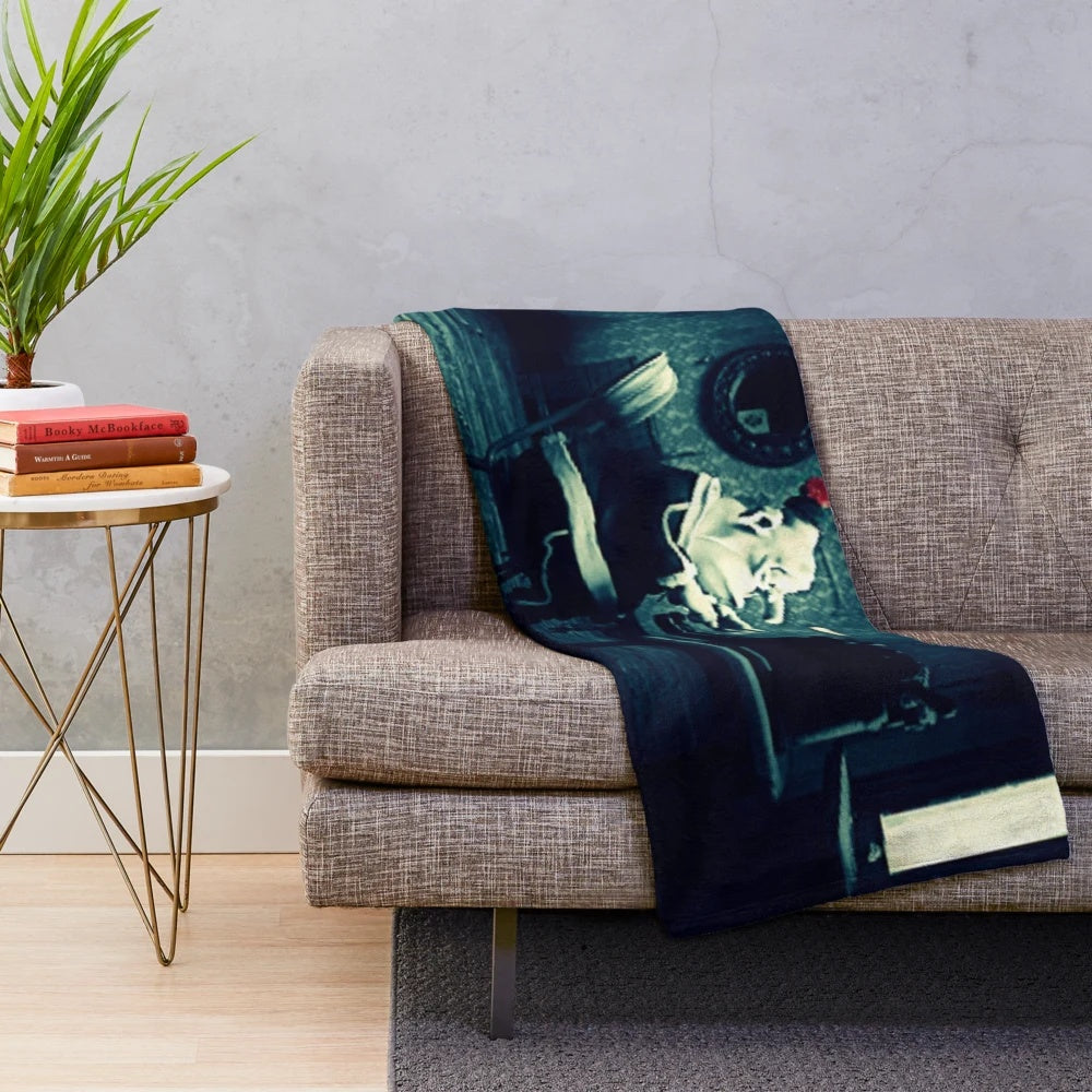 Plush blanket featuring characters from the beloved animated film "Mary and Max