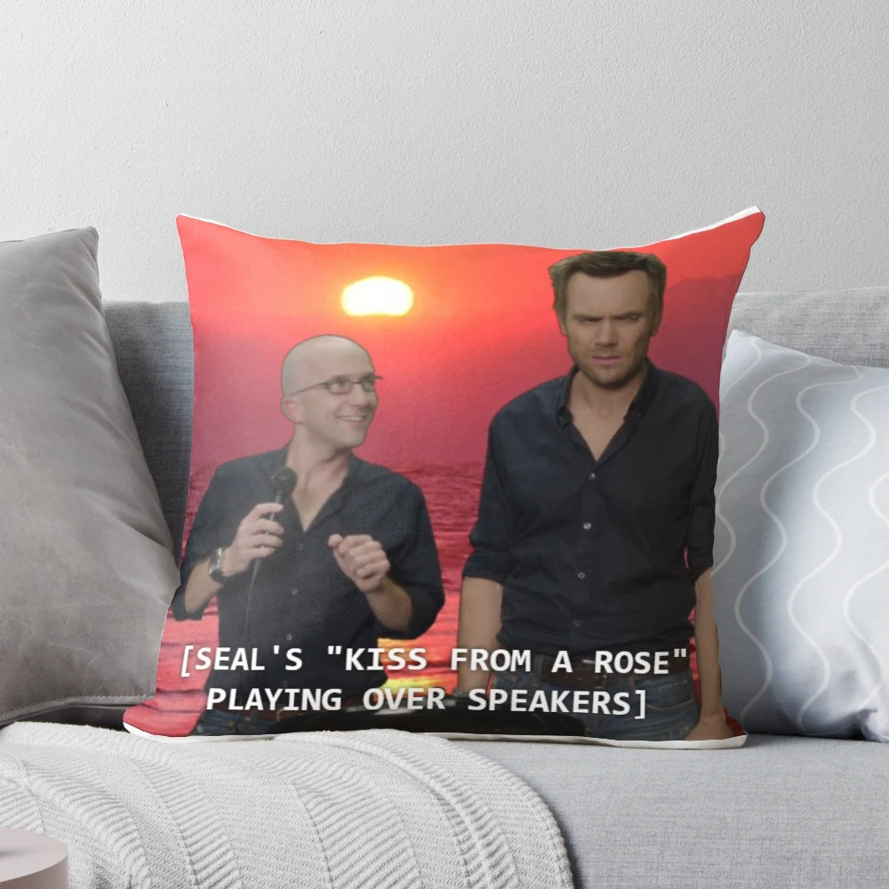 Community TV show inspired 'Kiss from a Rose' pillow featuring the characters Dean Pelton, Jeff Winger, and Britta Perry