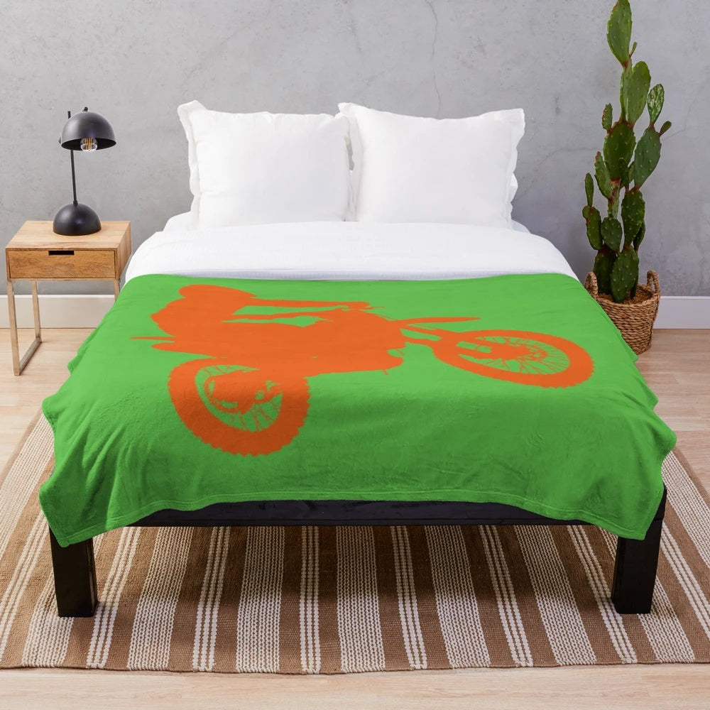 Motocross-inspired plush blanket for off-road enthusiasts