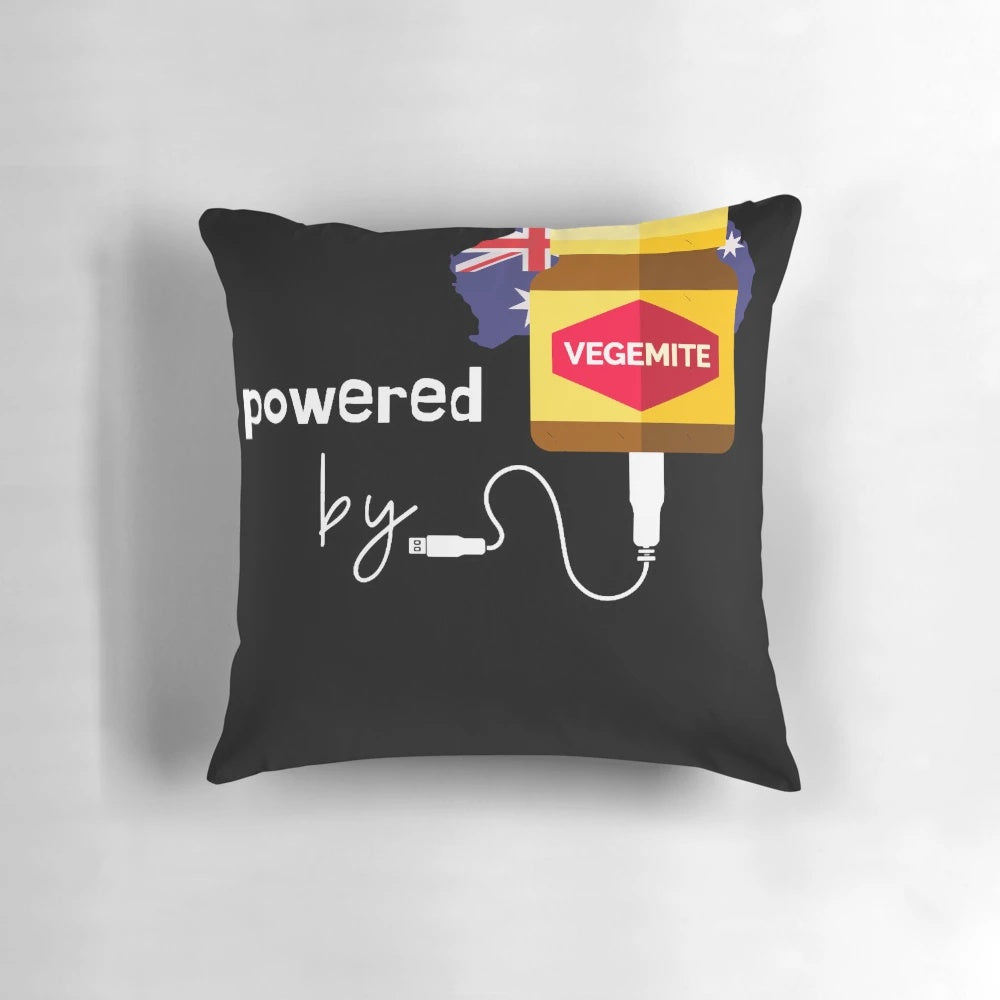 A soft, plush pillow with a vibrant "Powered by Vegemite" design, showcasing the plant-based essence of Australia.