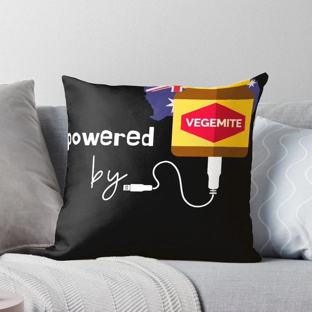 A soft, plush pillow with a vibrant "Powered by Vegemite" design, showcasing the plant-based essence of Australia.