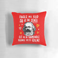 A plush, red pillow featuring the phrase "Roses Are Red, So Is the State. Let Us Be Comrades Because You Are Great.