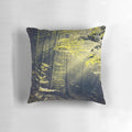 A Pillow featuring a serene forest landscape with rays of morning light filtering through the trees.